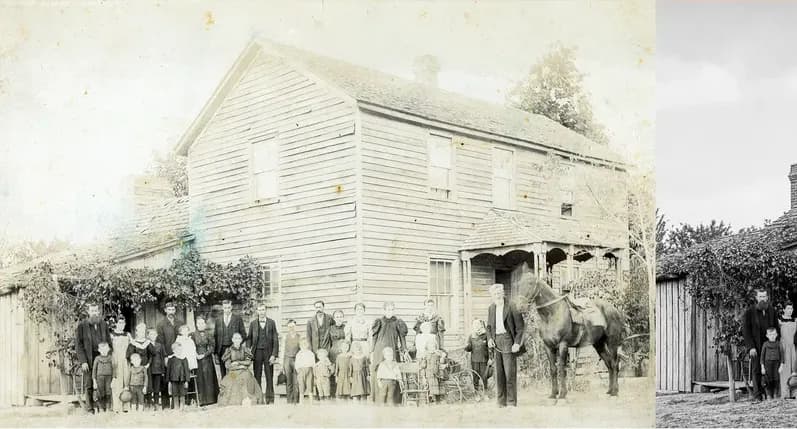 A treasured black-and-white photograph, worn with time, before being restored