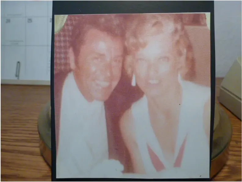 This faded photograph had faded and worn before restoration