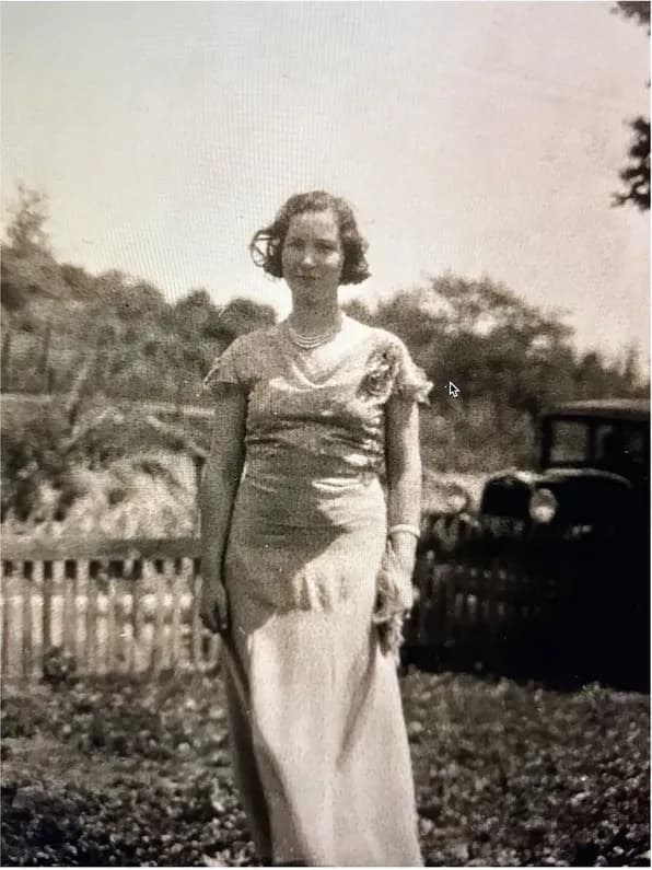 This faded photograph had faded and worn before restoration